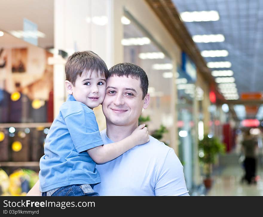 Dad and the son in shopping center. Dad and the son in shopping center