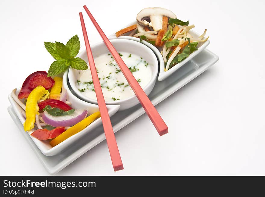 Mixed salad with chopsticks