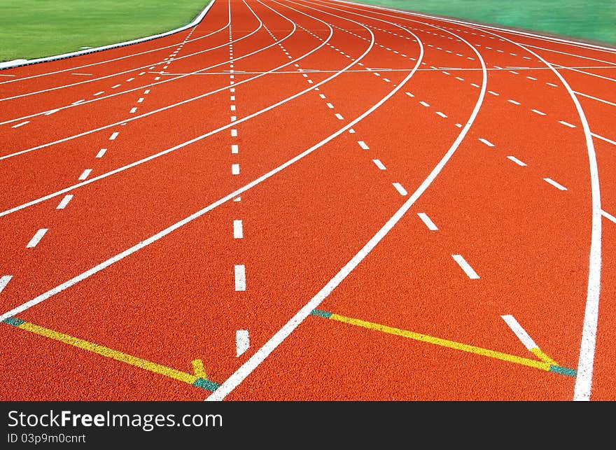 Running track with green grass