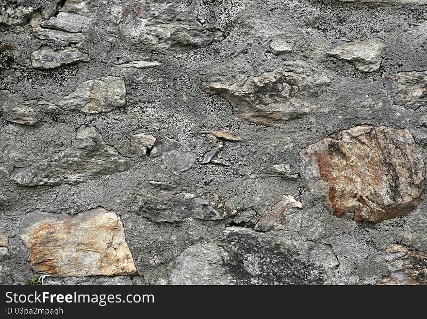 Closeup of stone wall use for construction business and designers (Textures)