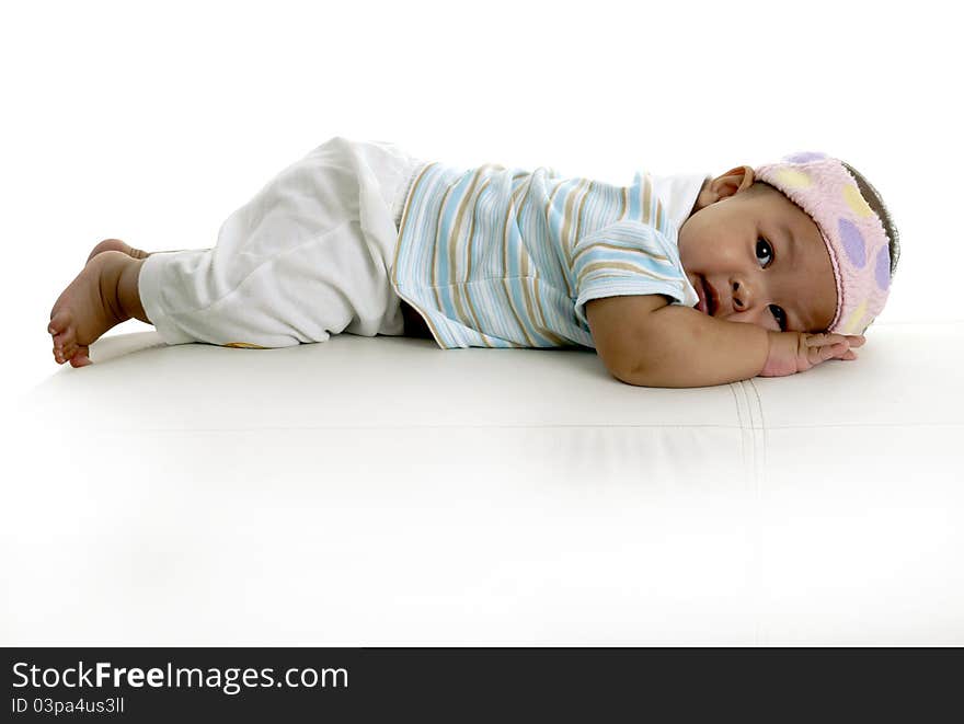 Baby Boy sleep on white sofa.