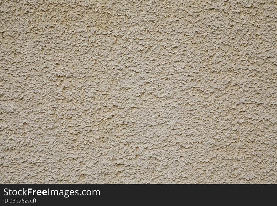 Texture of beige wall plastering. Texture of beige wall plastering