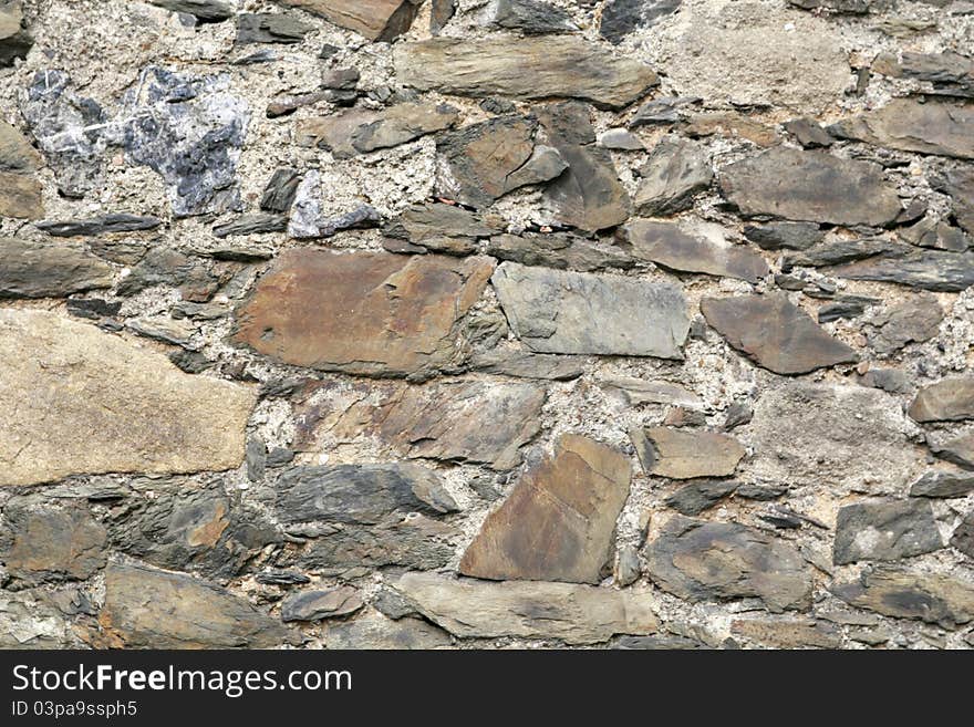 Closeup of stone wall use for construction business and designers (Textures)