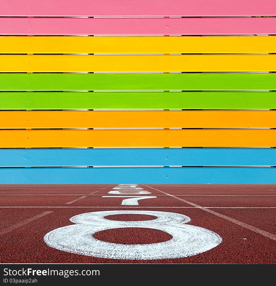 Multi Color vivid wooden wall with running lane floor