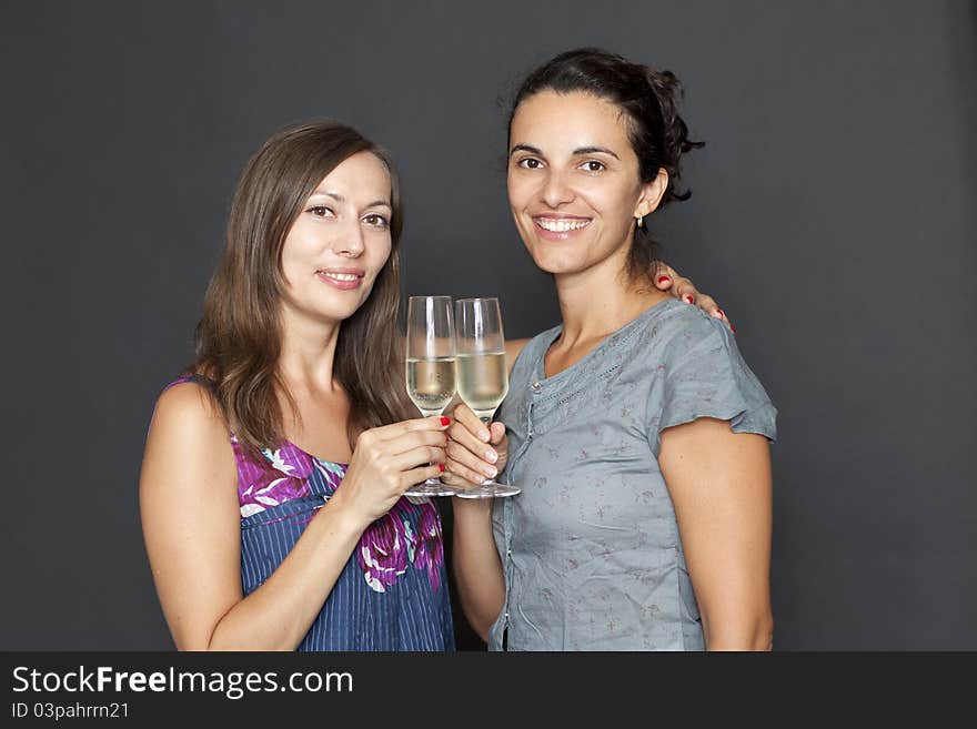 Two women celebrating a birthday. Two women celebrating a birthday