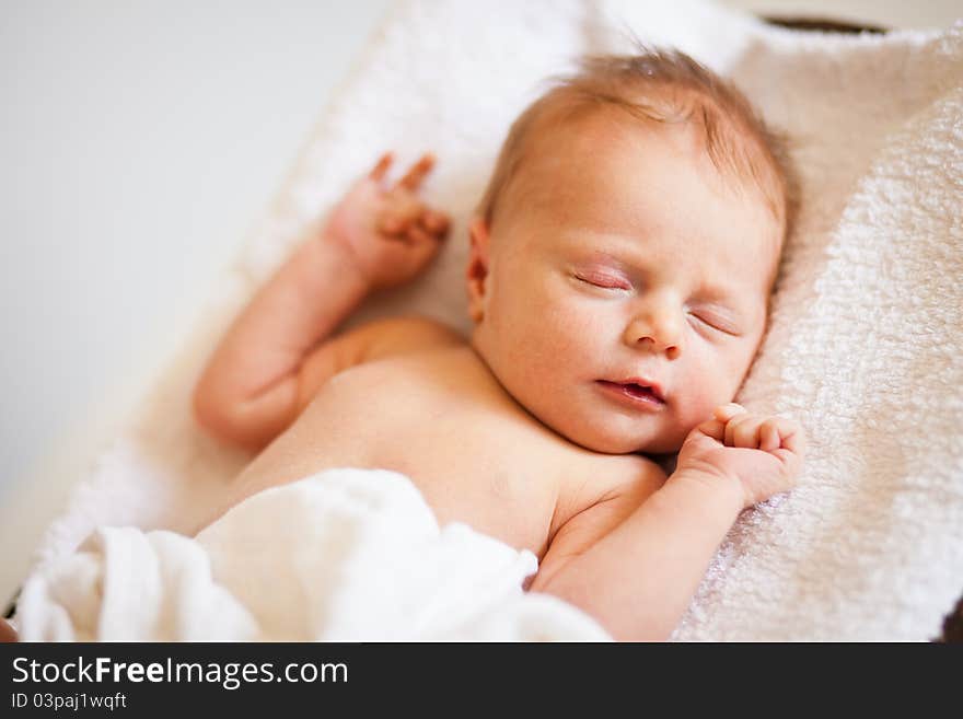 Portrait of a newborn caucasian girl