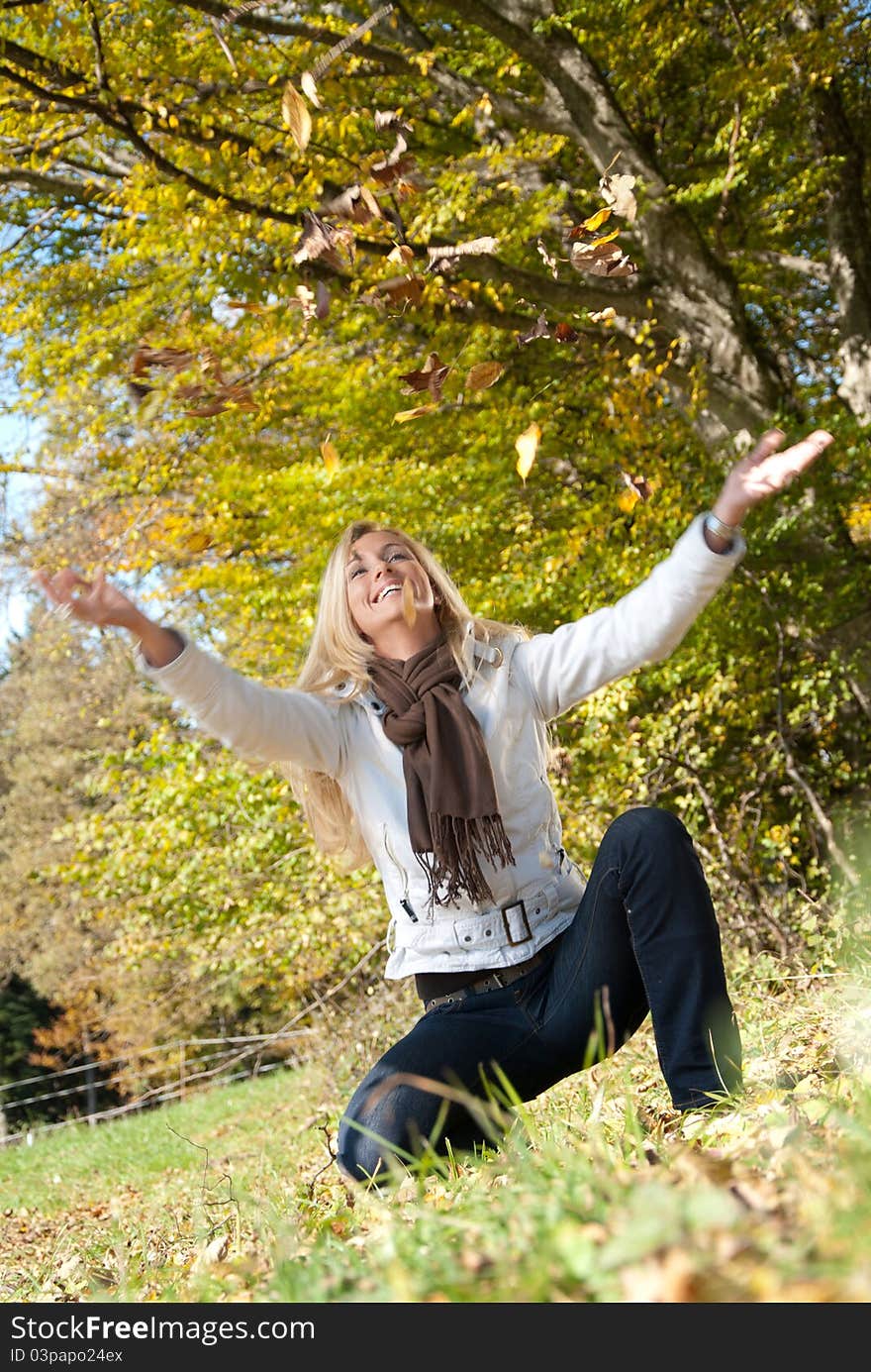 Healthy Young Blonde Woman In Autumn