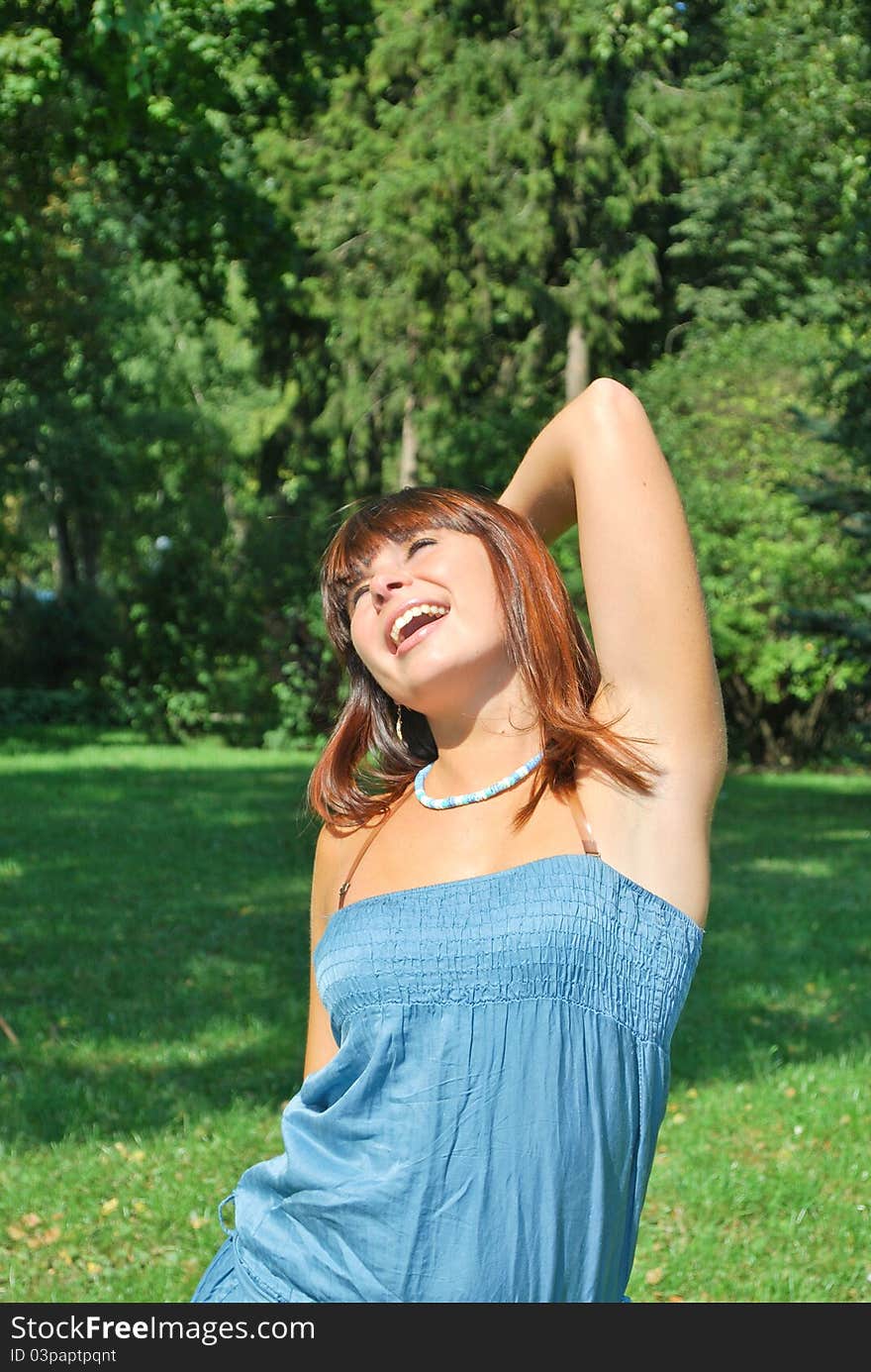 Beautiful young woman enjoying the nature. Beautiful young woman enjoying the nature