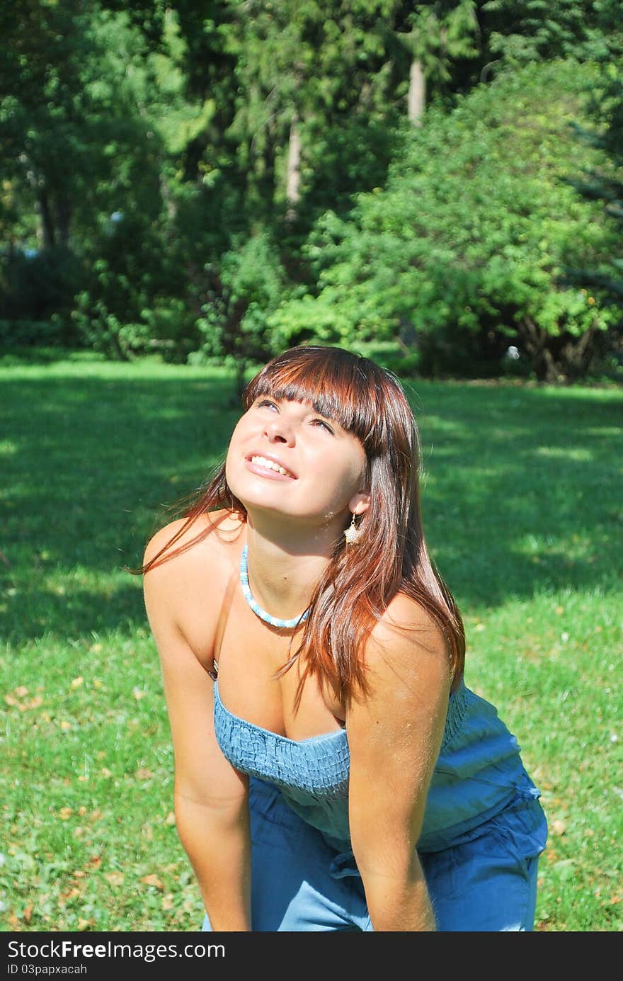 Beautiful young woman enjoying the nature. Beautiful young woman enjoying the nature