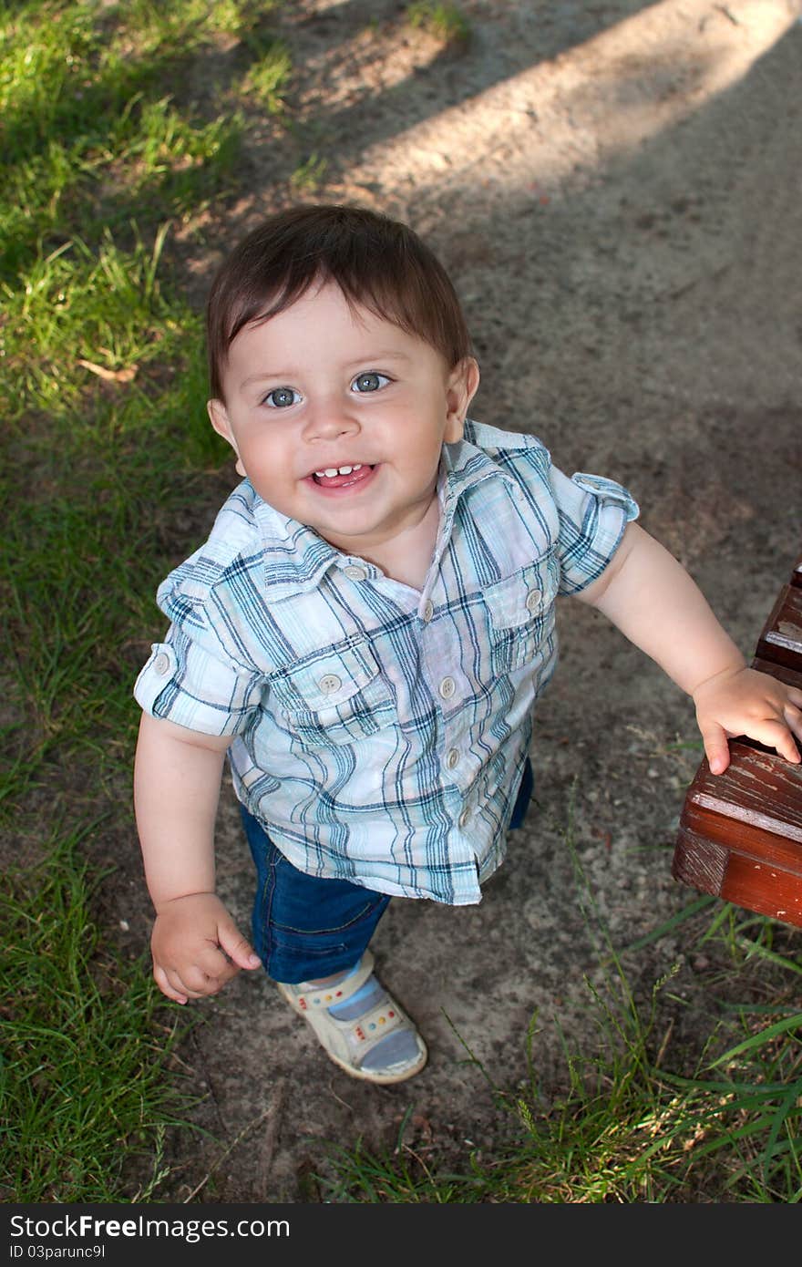 Beautiful little boy looking up