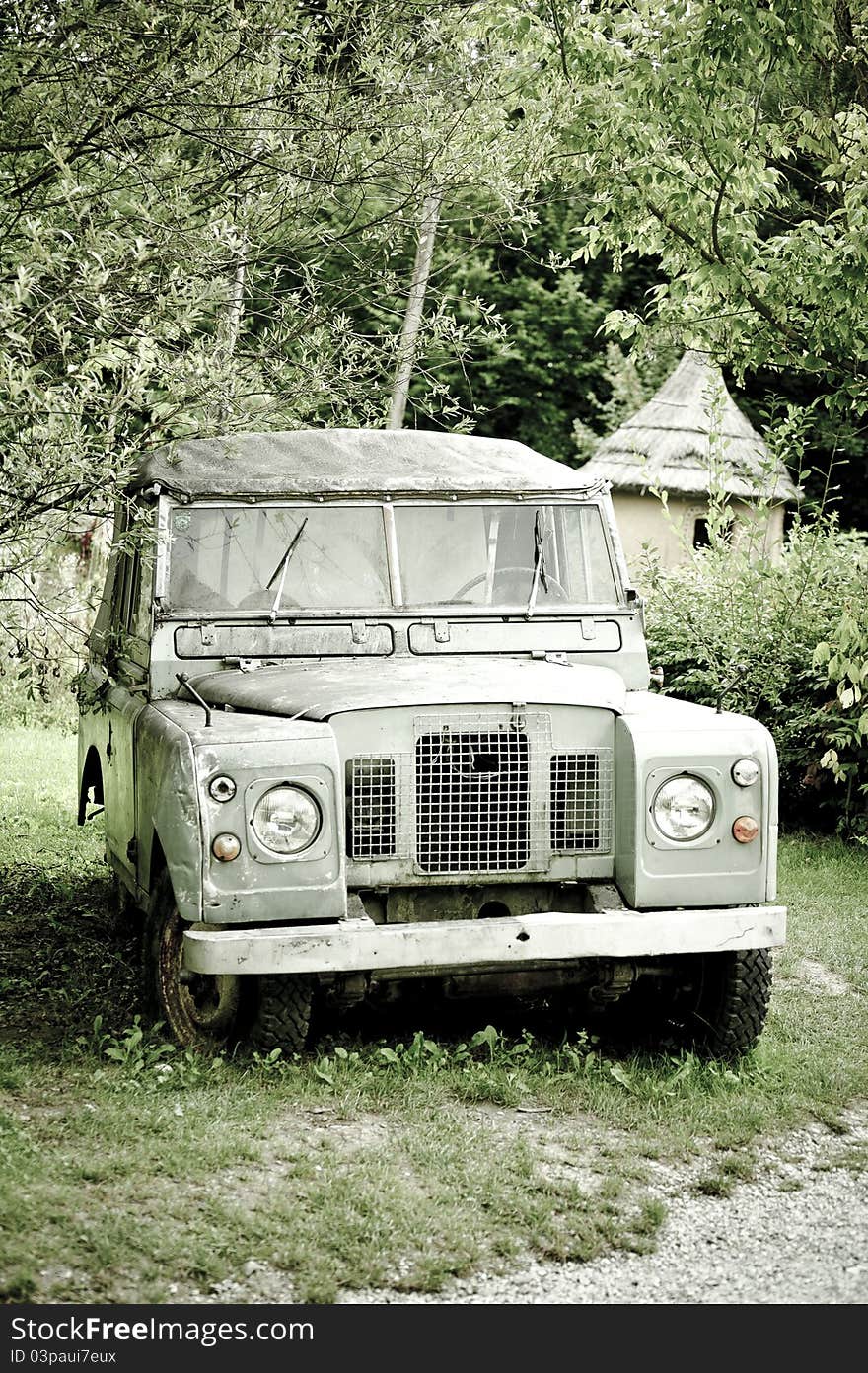 A jeep standing in a wildlife park.