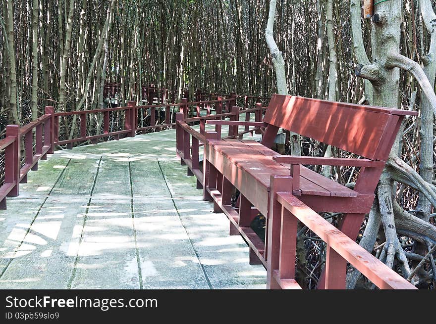 Brown wooden benches in the park.