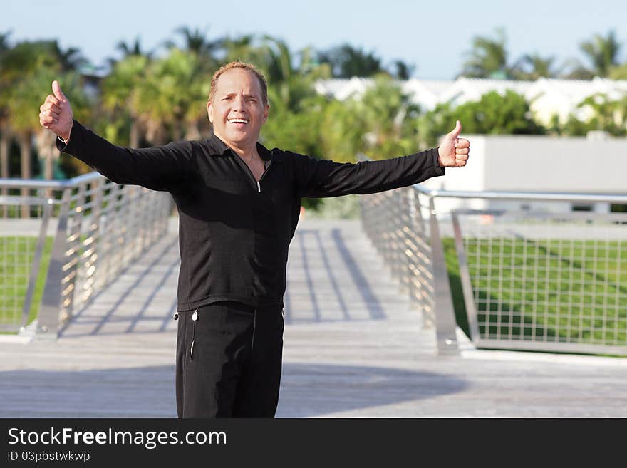 Man showing two thumbs-up