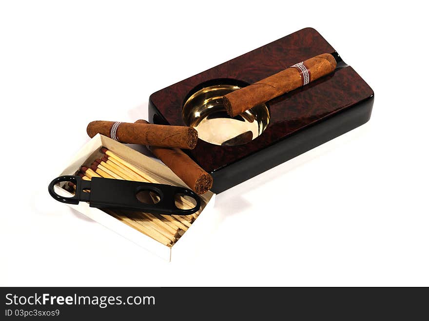 Cigar and ashtray with a knife and matches