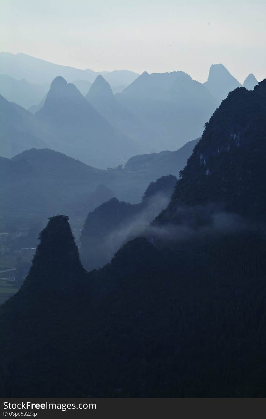 Karst scenery in misty morning in Guilin, China. Karst scenery in misty morning in Guilin, China