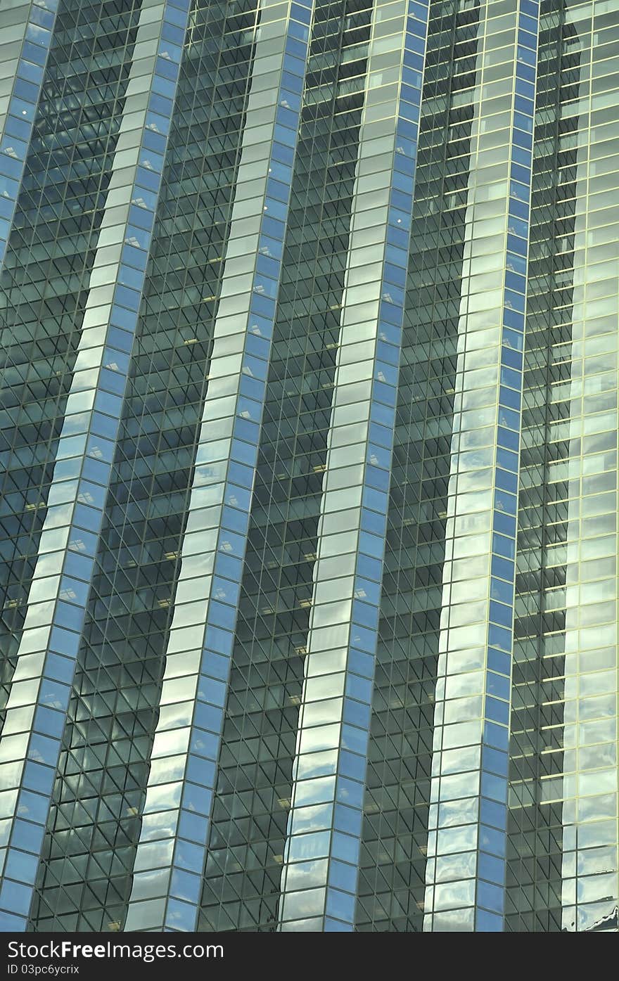 Shot of modern glass building showing details and abstract lines. Shot of modern glass building showing details and abstract lines.