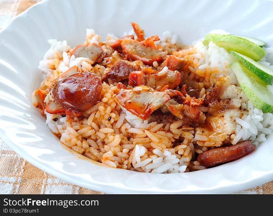 Barbuced red pork in sauce with rice