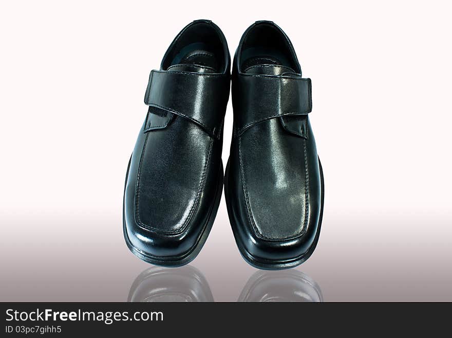 Men's black leather shoes. Place isolated on white background.