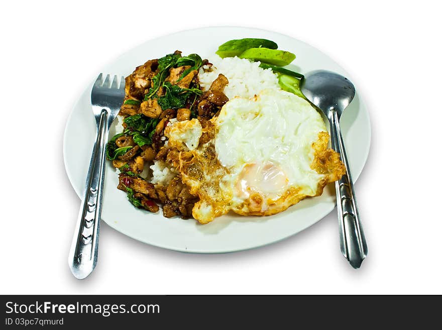 Stir fried Chicken with basil and egg served with rice. Stir fried Chicken with basil and egg served with rice