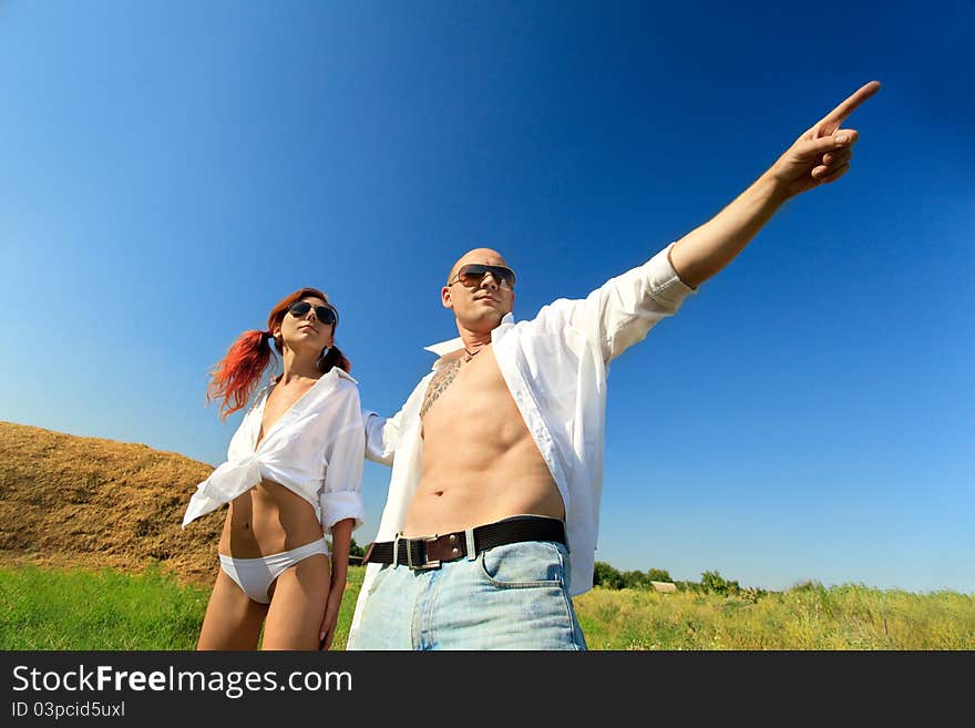 happy couple on wheat field