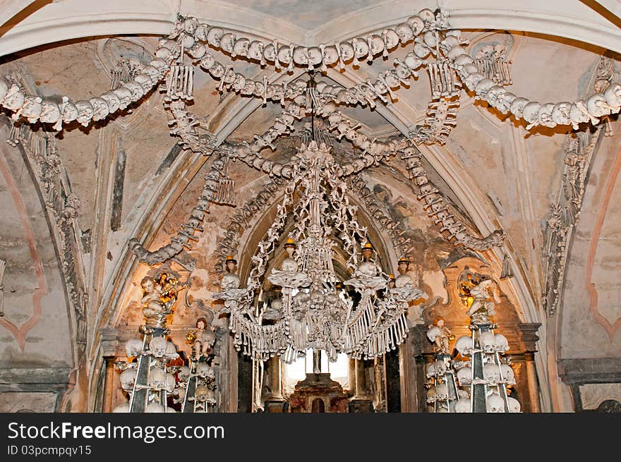 A chandelier constructed by bones, skulls and jaws in Sedlec Ossuary monastry, Kutna Hora, Czech Republic.