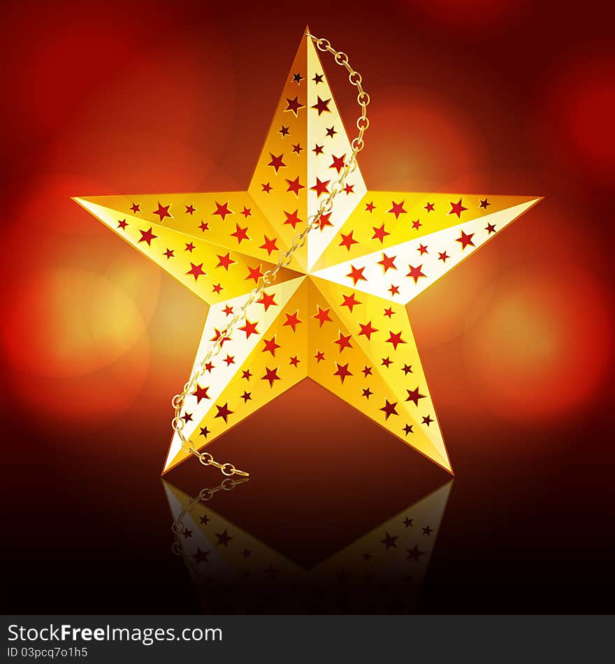 Gold Christmas star with chain reflected on a glossy surface with glowing circle red background