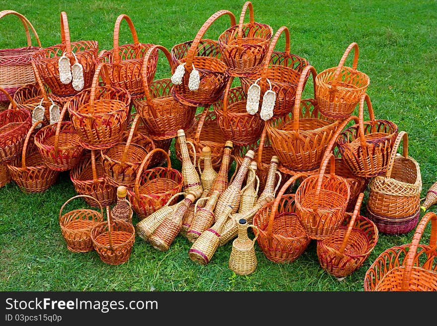 Woven baskets on green grass