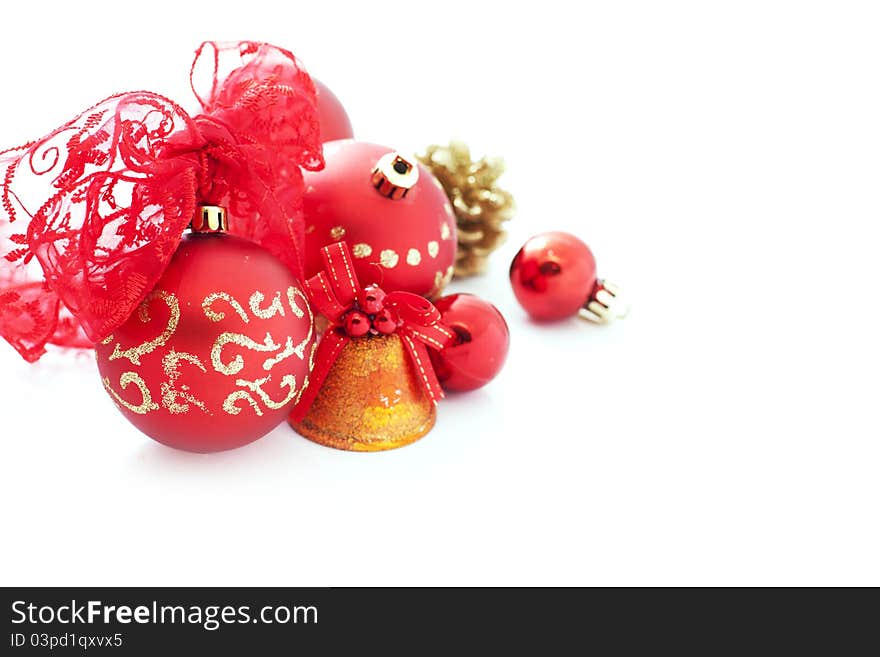 Red christmas decorations over white