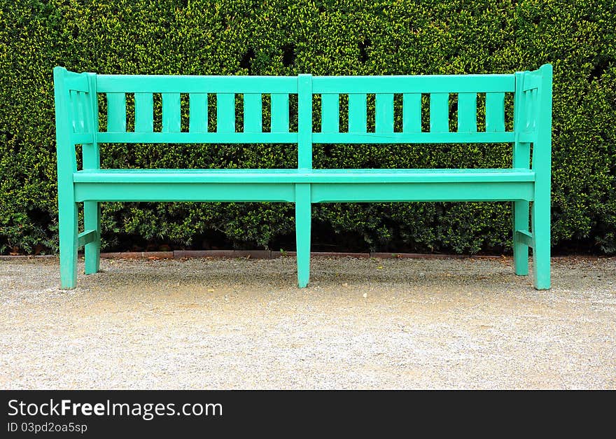 Green wooden bench in the garden. Green wooden bench in the garden