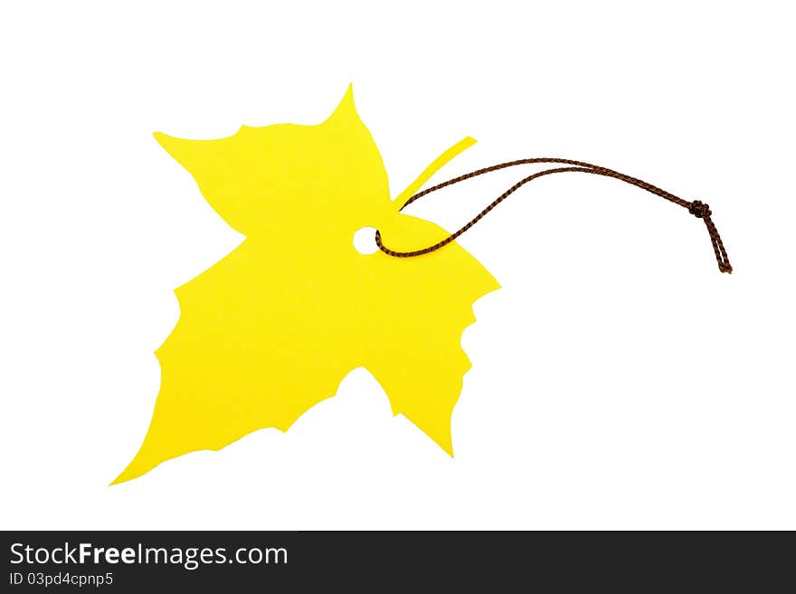 Maple leaf-shaped label tied with brown string, isolated on white