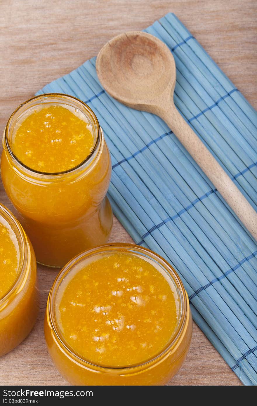 Studio-shot of homemade small yellow plum ( mellow mirabelle ) jam in a glass jar. Studio-shot of homemade small yellow plum ( mellow mirabelle ) jam in a glass jar.