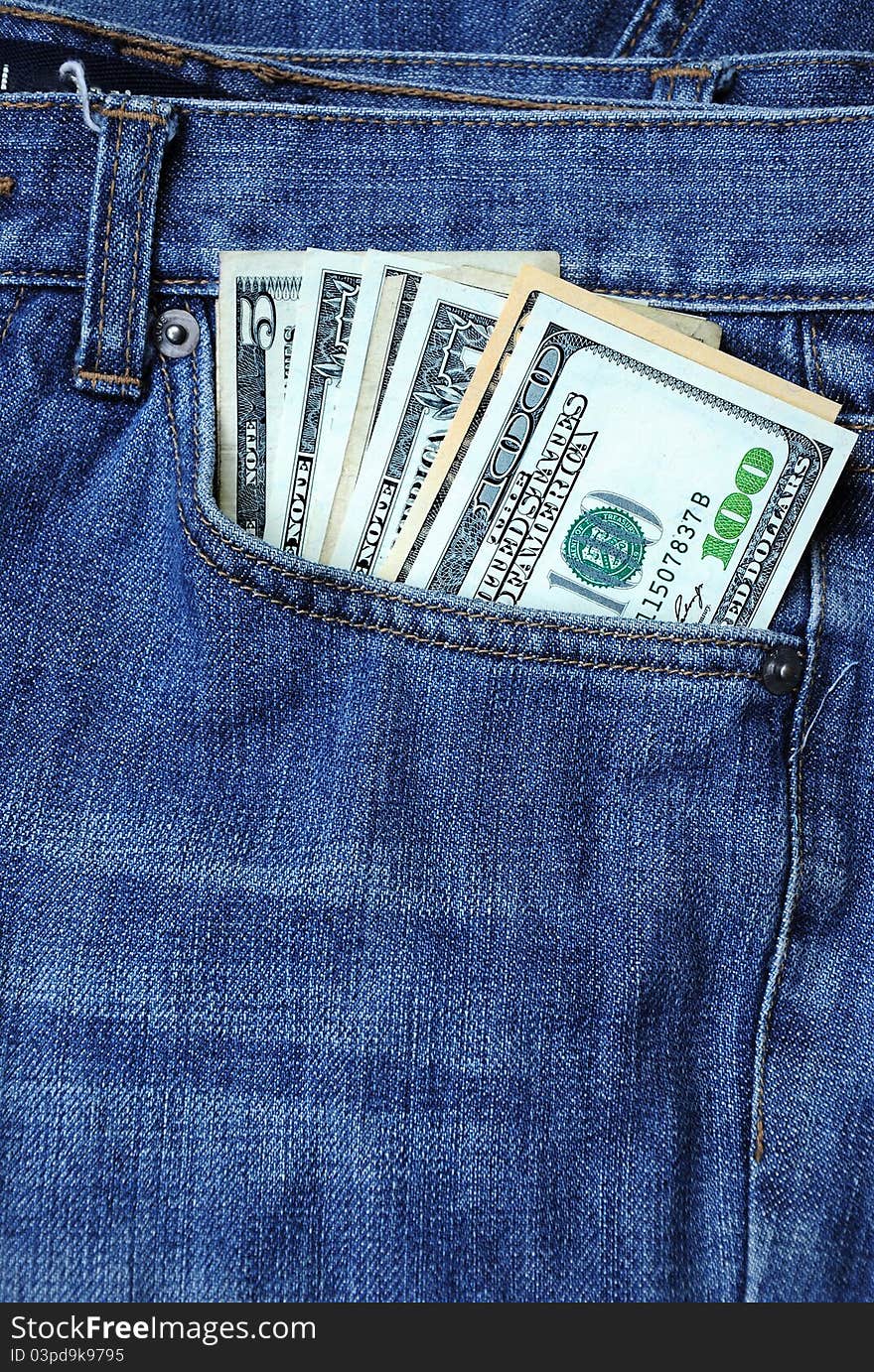 Dollars banknote in blue jeans pocket. Dollars banknote in blue jeans pocket