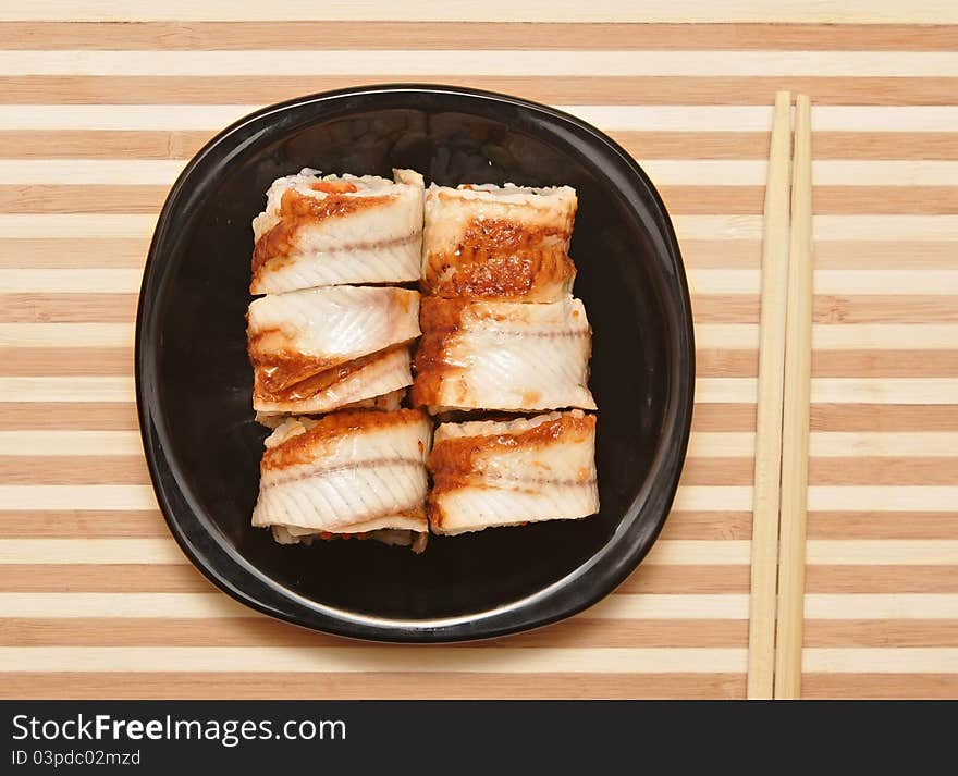 Sushi With Chopsticks