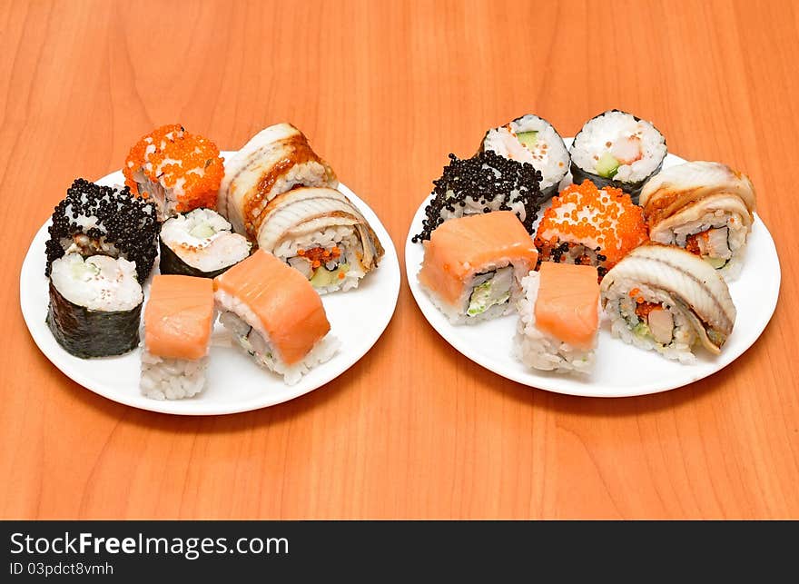 Traditional sushi and rolls on the dish