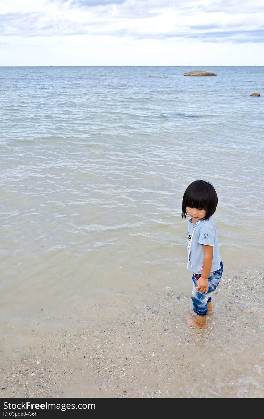 Little Asian Girl At The Beach