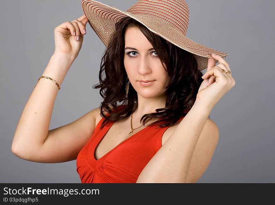 Portrait of a pretty girl in hat