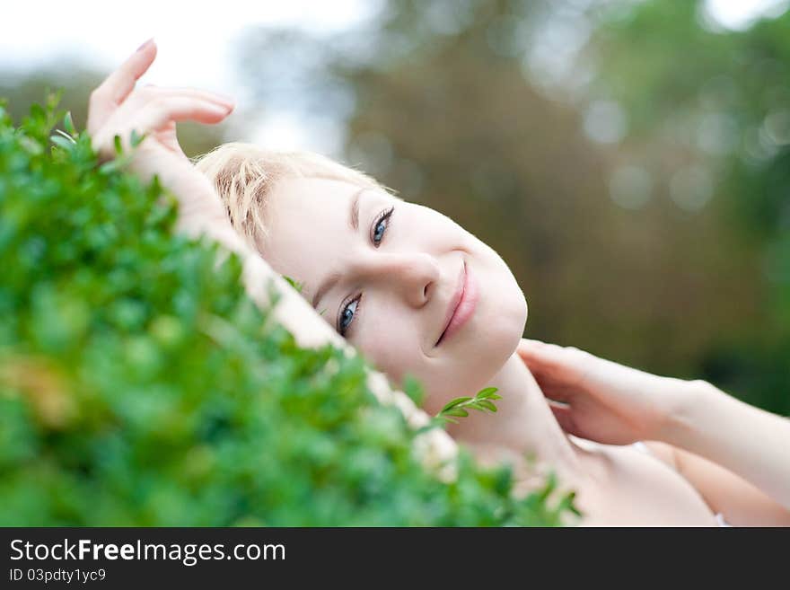 Closeup portrait of beautiful smiling woman outdoo