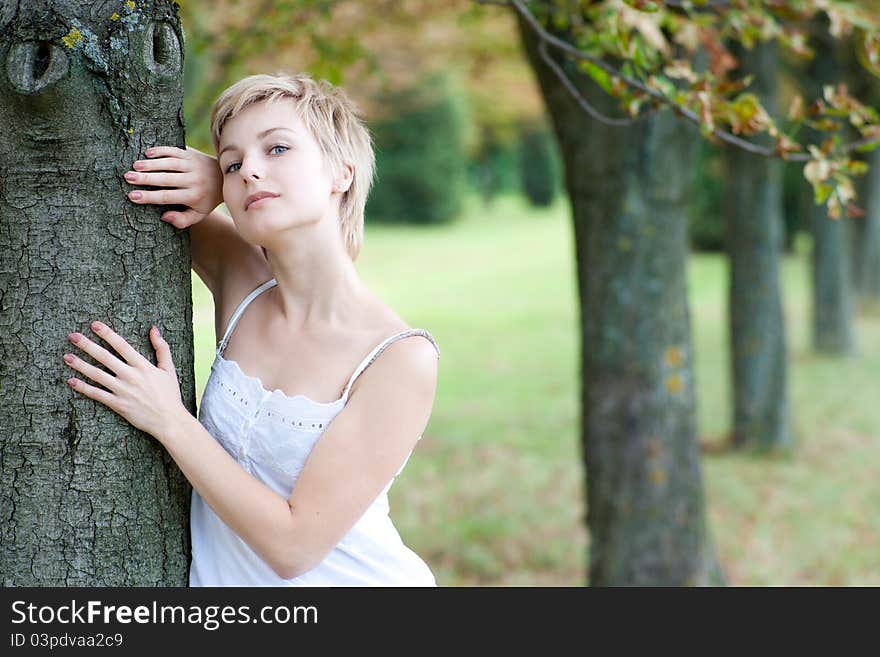 Outdoors portrait of happy young woman