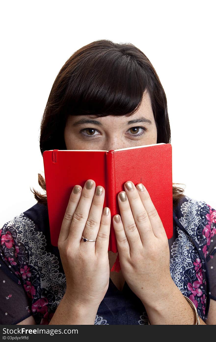 A young woman reading a book. A young woman reading a book