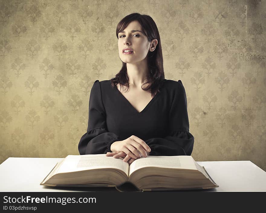 Young woman reading a book. Young woman reading a book