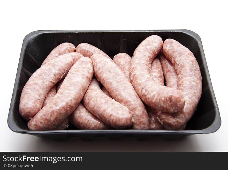 Fried sausages in the plastic packaging