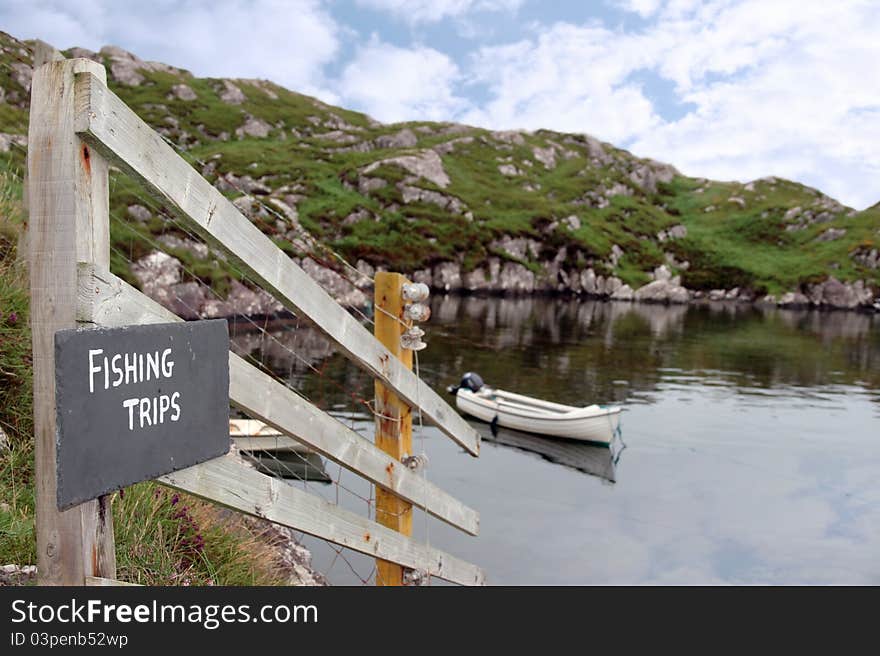 Fishing trips sign and scenic view