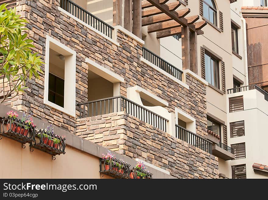 Balcony with flowers on a modern apartment. Balcony with flowers on a modern apartment