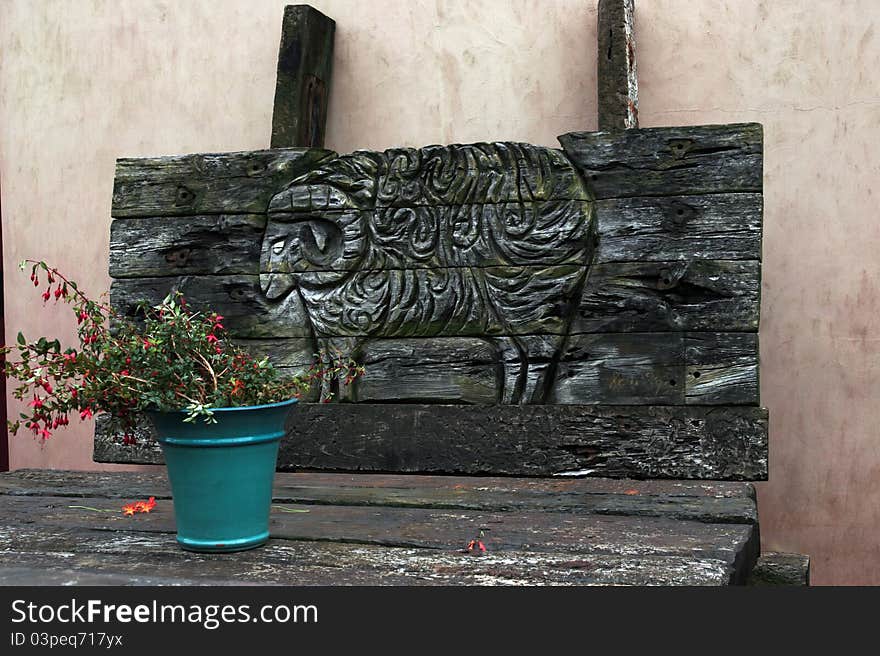 Outdoor table and carved bench in ireland. Outdoor table and carved bench in ireland