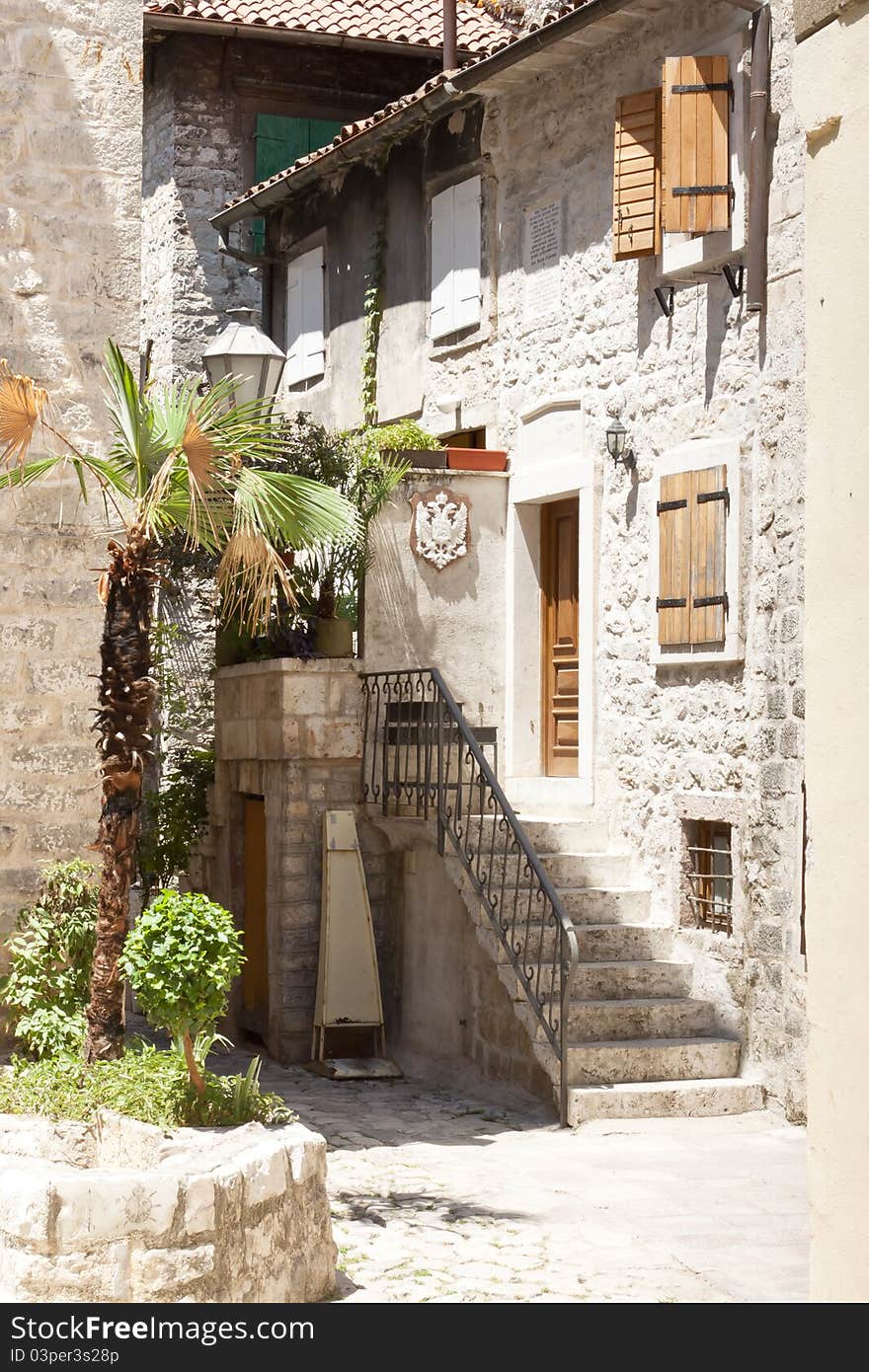 Small city street in Kotor UNESCO town in Montenegro. Small city street in Kotor UNESCO town in Montenegro.