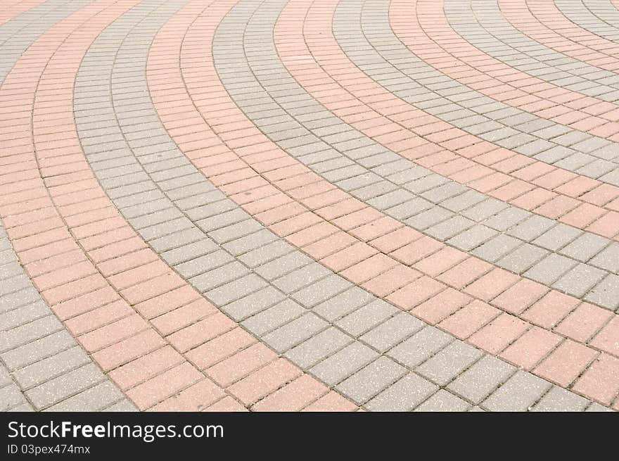 A circular tiled pavement as a background