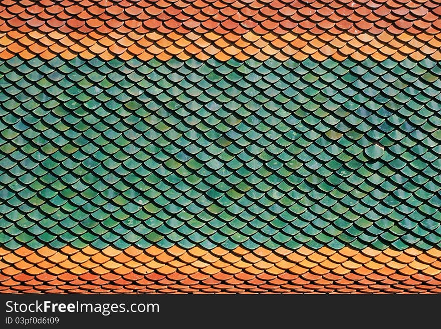 Colorful Tiles of Thai Temple Roof are beautiful