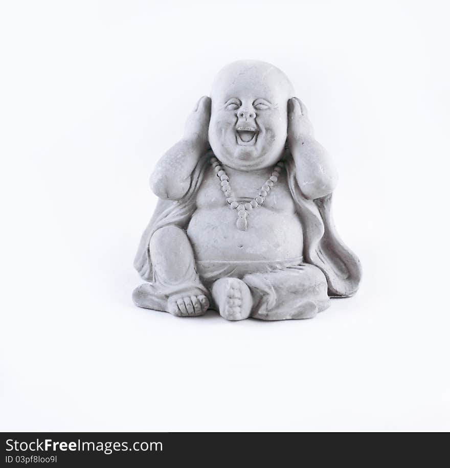 A small statue isolated on a white background. A small statue isolated on a white background