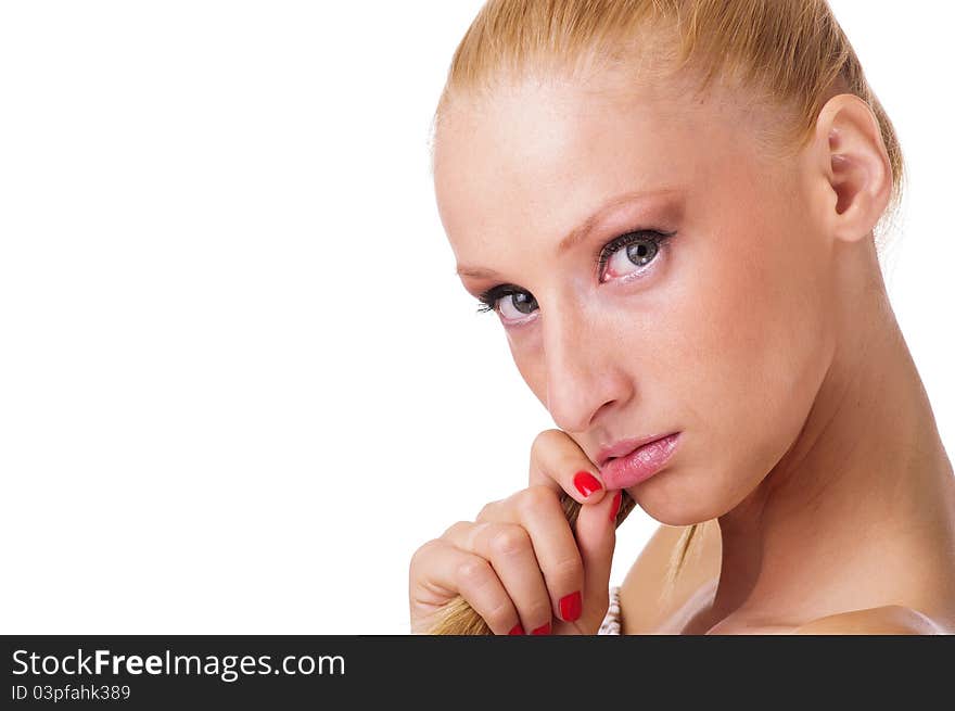 Portrait of pretty young woman playing with her lips and had a sad expression