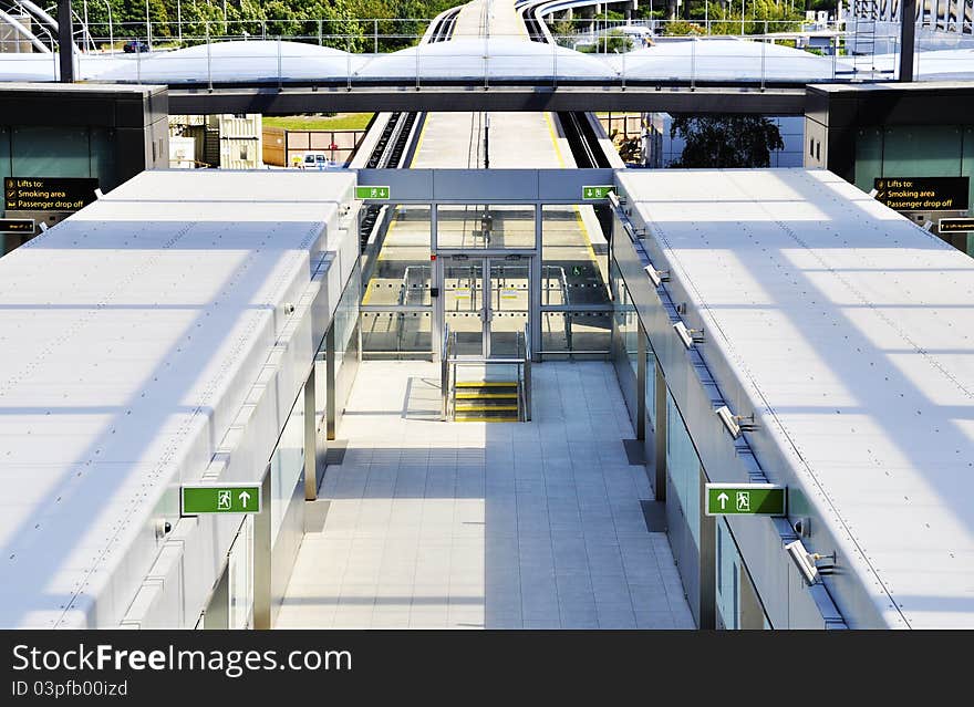 Shuttle station between two terminals in an airport. Shuttle station between two terminals in an airport